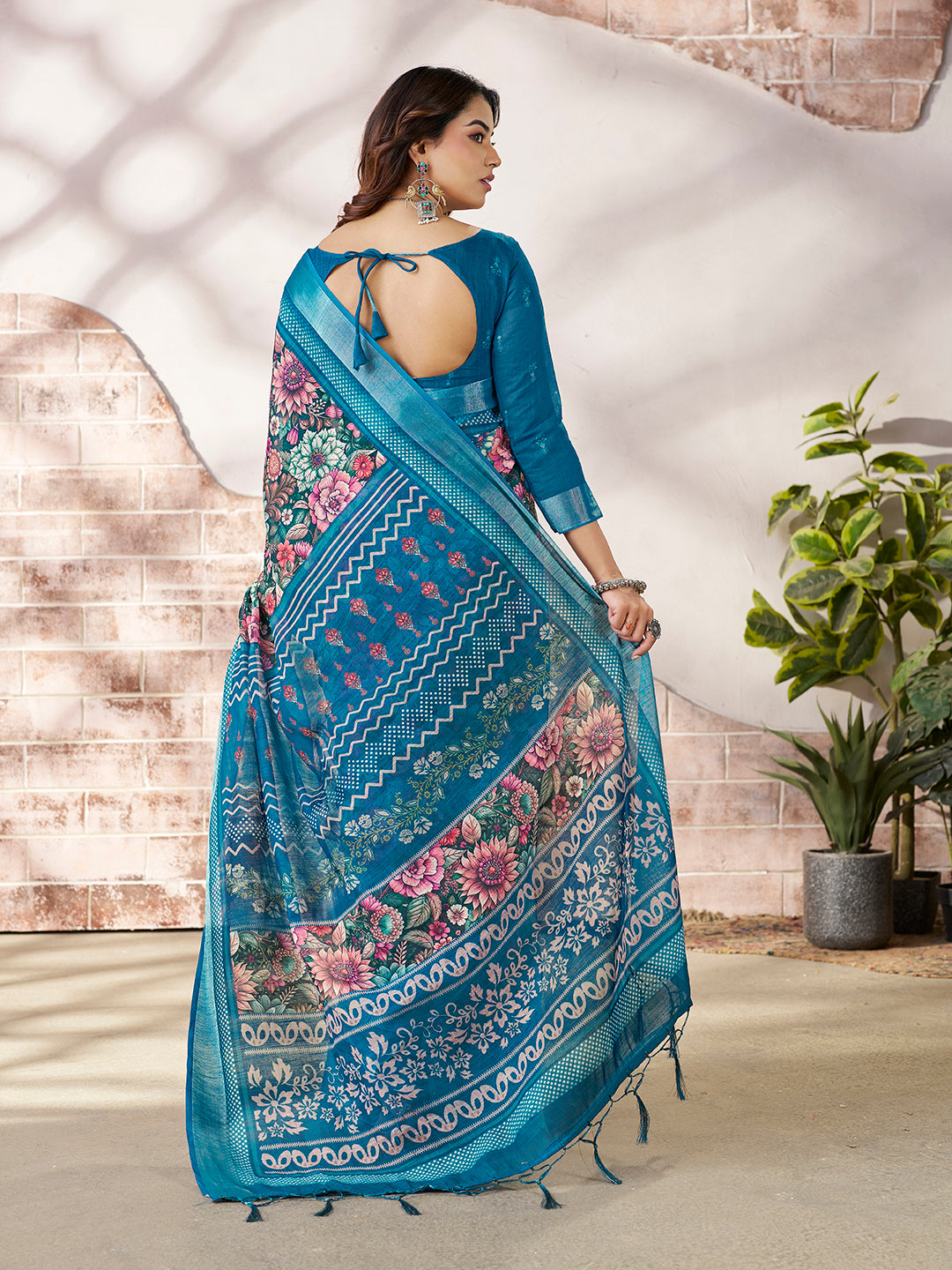 Stylish Teal Blue Printed Saree with Border Detail