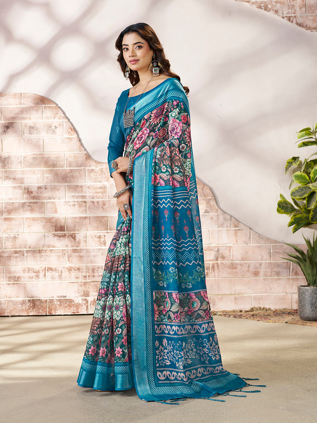 Stylish Teal Blue Printed Saree with Border Detail