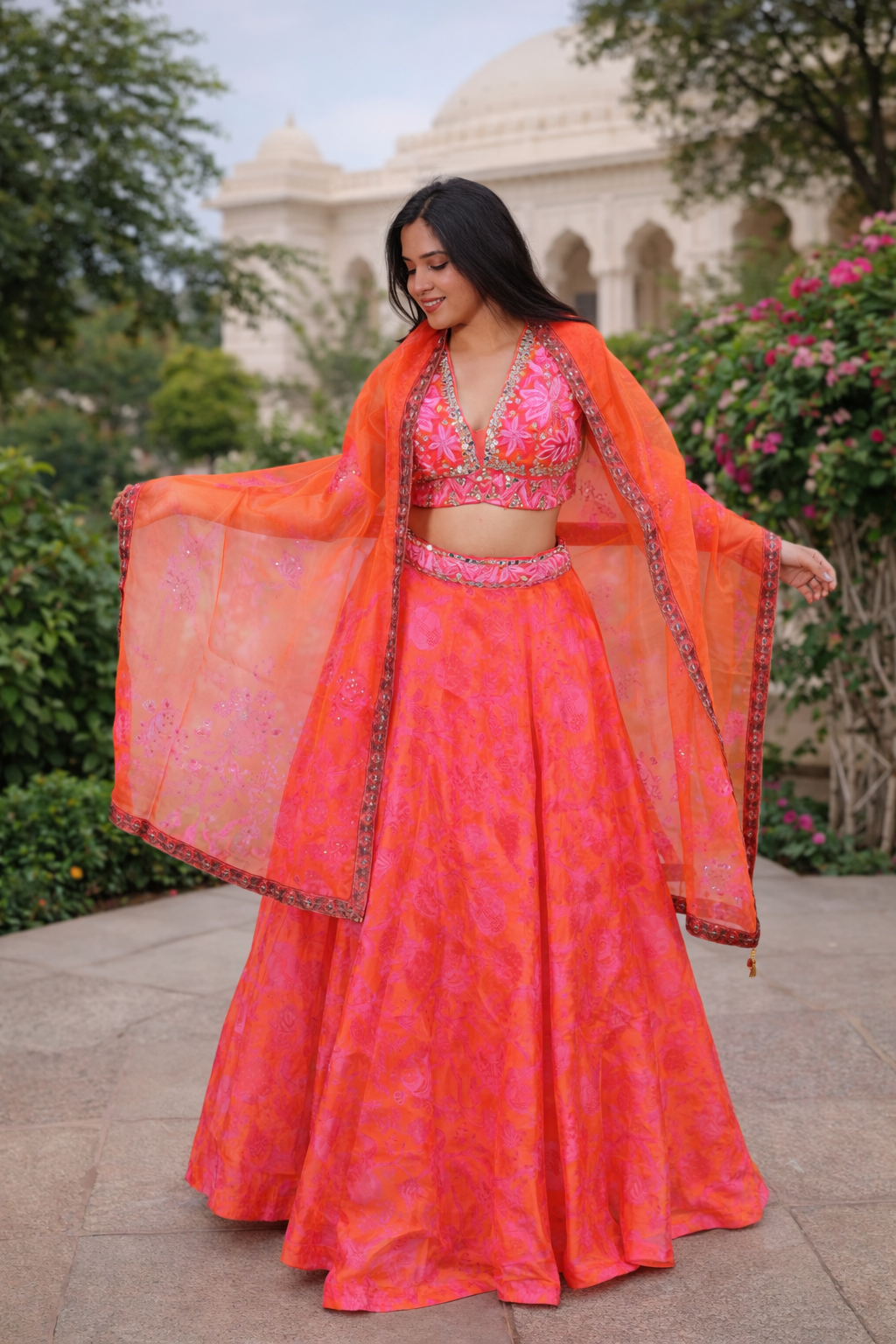 Vibrant Orange & Pink Floral Printed Lehenga Set with Embroidered V-Neck Blouse & Dupatta