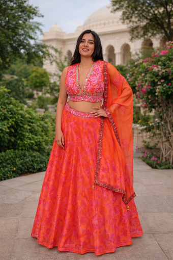 Vibrant Orange & Pink Floral Printed Lehenga Set with Embroidered V-Neck Blouse & Dupatta