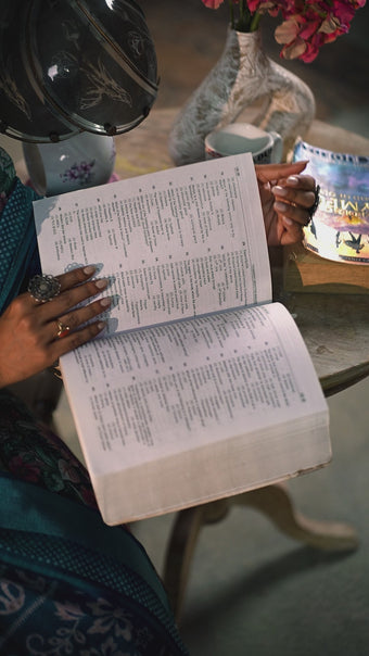 Stylish Teal Blue Printed Saree with Border Detail